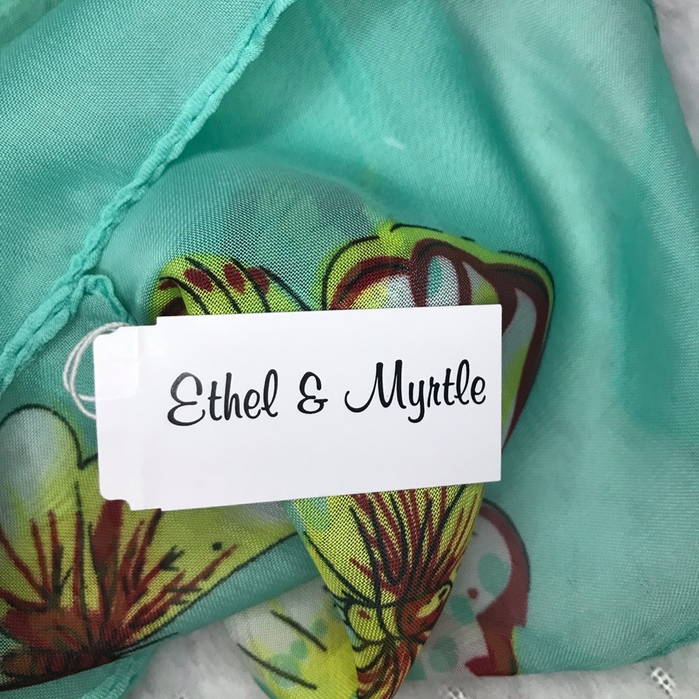 This is a NWT butterfly ombré tan to green scarf